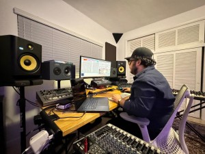 Christian “Tian” Jimenez uses KRK Rokit monitors and subwoofer while producing and mastering